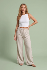 Ruime beige broek met schelpjes