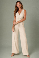 Vloeiende jumpsuit met V-hals en wijde pijpen