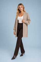 Beige lang gilet met pofmouwen