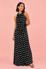 Zwarte jurk met polkadots en halterhals