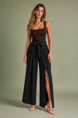 Hoge taille wijde broek met split