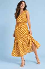 Gele maxi-jurk met polkadotprint, hooggesloten hals en drapering