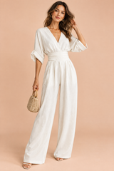 Witte jumpsuit met V-hals en wijde pijpen