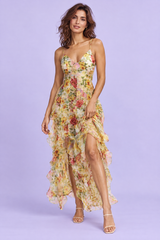 Gele asymmetrische maxi-jurk met lelieprint en cape-mouwen