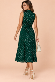 Robe midi vert foncé à pois et dos nu | Vue de dos | Lounelle Paris