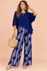 Blauwe tweedelige broekset met stippenprint