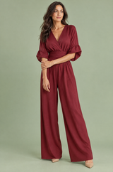 Bordeauxrode jumpsuit met V-hals en wijde pijpen