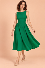 Robe verte à encolure bateau et coupe trapèze | Vue en mouvement | Lounelle Paris