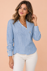 Gestreepte asymmetrische lichtblauwe blouse