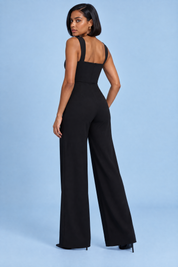 Combinaison noire à décolleté cœur et jambes larges | Vue de dos | Lounelle Paris