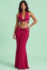 Magenta halterset met gedrapeerde maxirok