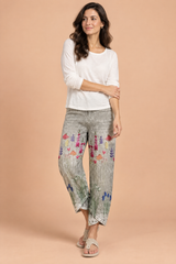 Grijze broek met bloemenprint en splitzoom