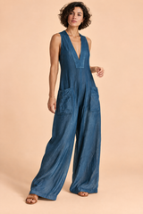 Blauwe jumpsuit met V-hals en wijde pijpen