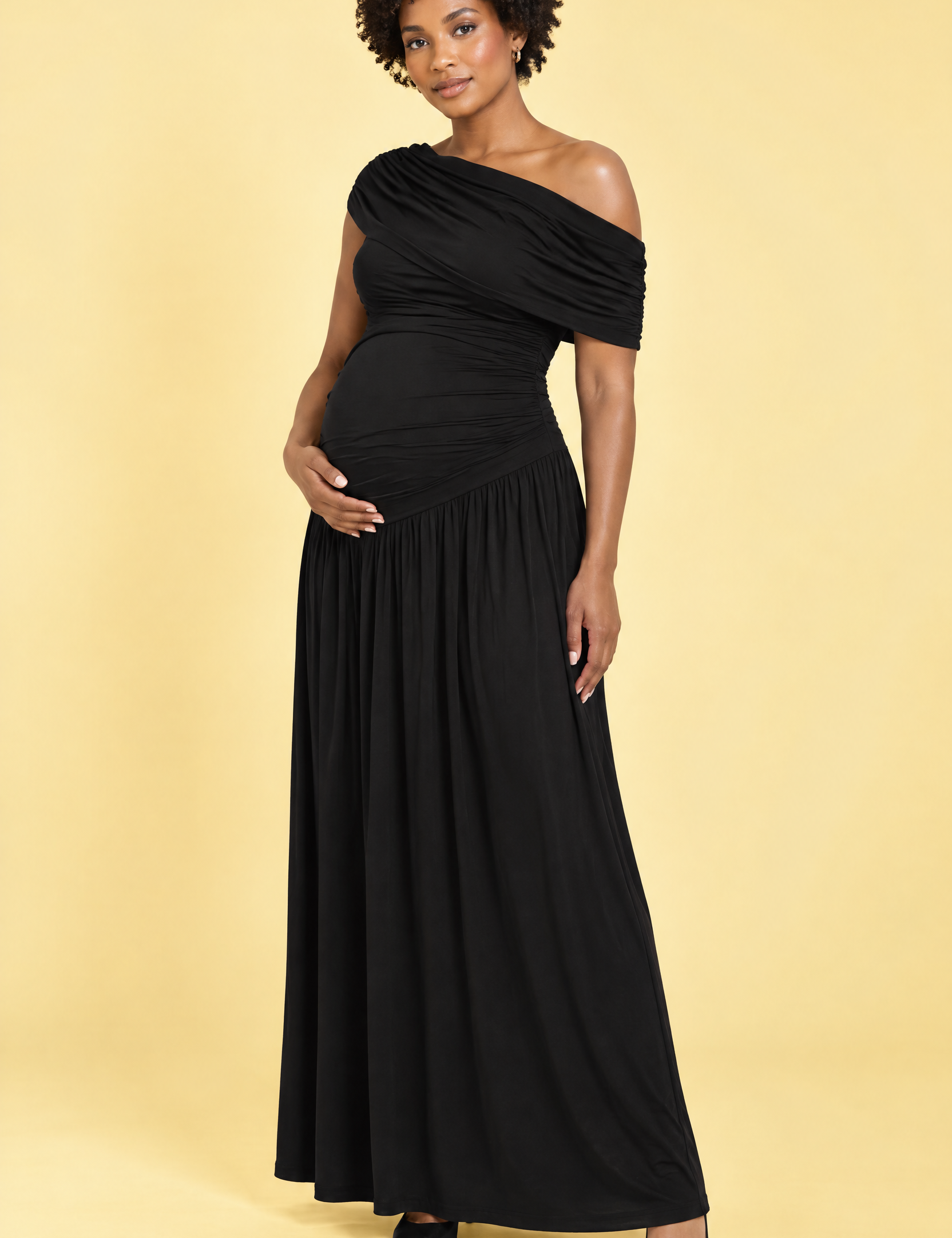 Robe longue de grossesse noire à encolure asymétrique et taille basse | Vue de face | Lounelle Paris