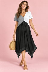 Asymmetrische zwarte midi-jurk met V-hals