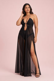 Robe longue noire asymétrique à découpes | Porté sur une silhouette plus ronde | Lounelle Paris
