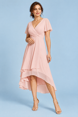 Roze jurk met volantmouwen en high-lowzoom