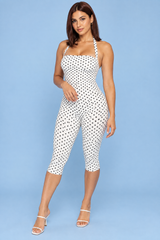 Witte aansluitende jumpsuit met stippen