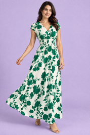 Robe longue verte à fleurs et taille smockée | Vue en mouvement | Lounelle Paris