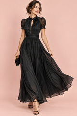 Zwarte geplooide maxi-jurk