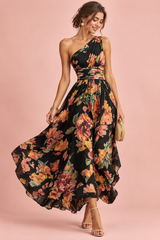 Zwarte gebloemde asymmetrische maxi-jurk
