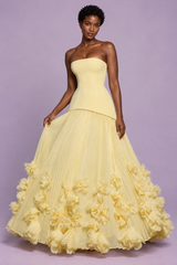 Gele strapless geplisseerde galajurk