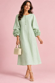 Robe midi vert menthe coupe trapèze à manches bouffantes | Vue de face | Lounelle Paris