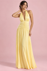 Gele maxi-jurk met diepe halslijn en rimpeldetails