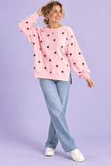 Roze oversized sweater met stippen