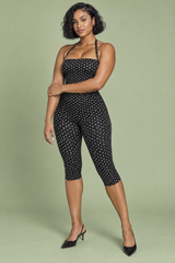 Zwarte aansluitende jumpsuit met stippen