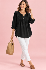 Zwarte katoenen blouse met ronde hals en plooien