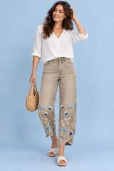 Beige broek met bloemenprint en splitzoom