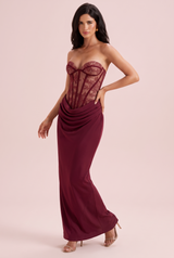 Bordeauxrode strapless maxi-jurk met korset