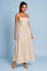Lange beige gestreepte rugloze jurk