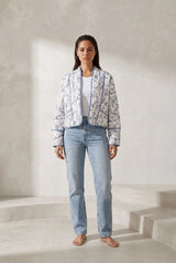 Veste matelassée blanche à imprimé floral